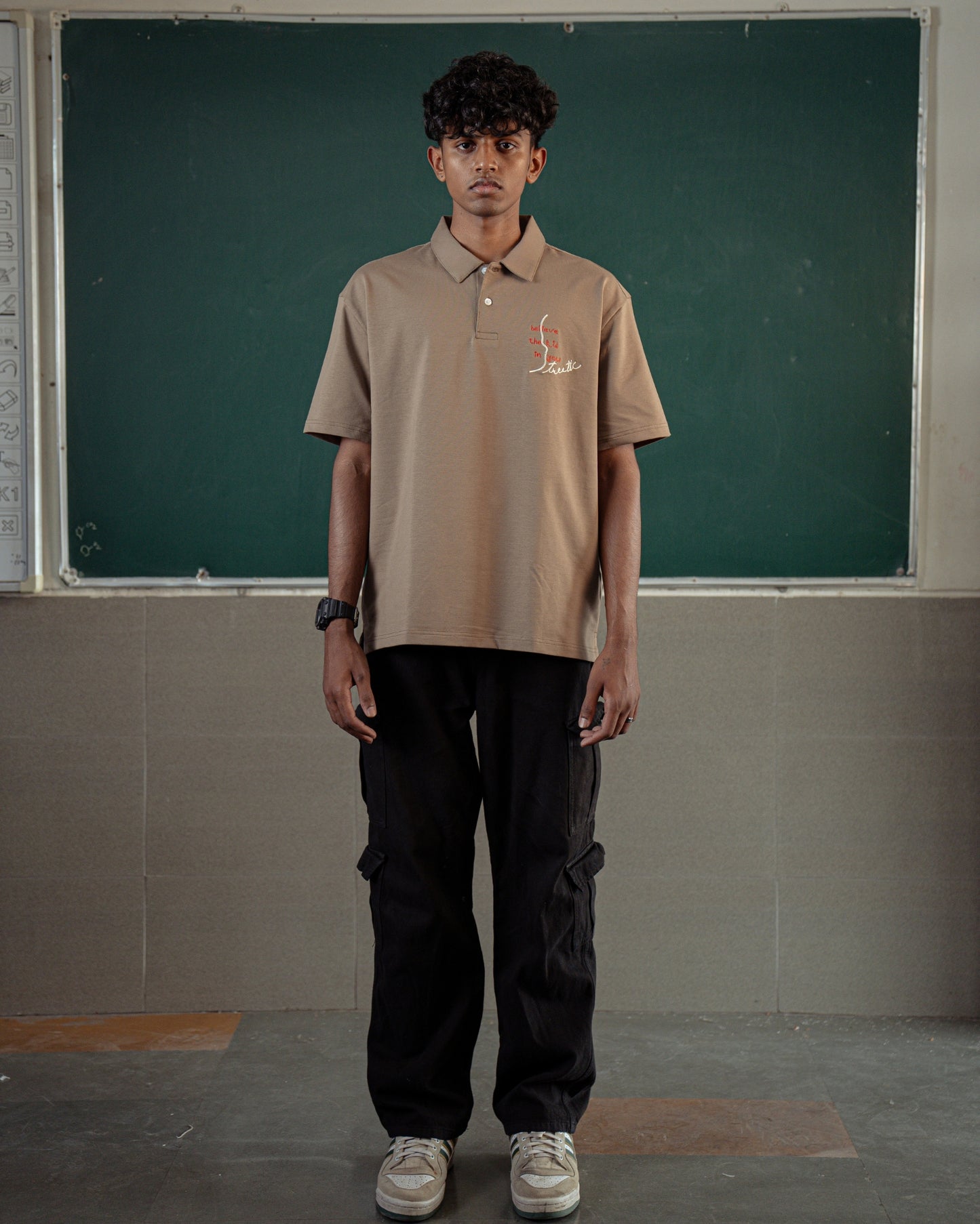 BELIEVE THE KID IN YOU EMBROIDERED KHAKI POLO