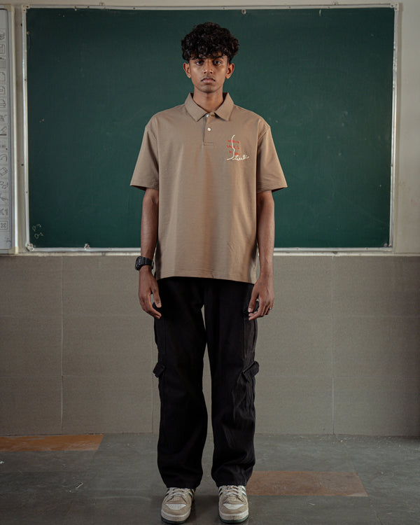 BELIEVE THE KID IN YOU EMBROIDERED KHAKI POLO