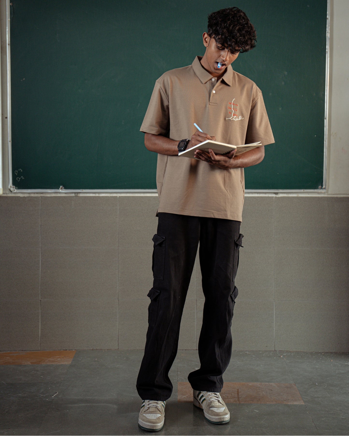 BELIEVE THE KID IN YOU EMBROIDERED KHAKI POLO