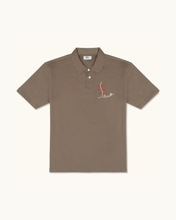 BELIEVE THE KID IN YOU EMBROIDERED KHAKI POLO