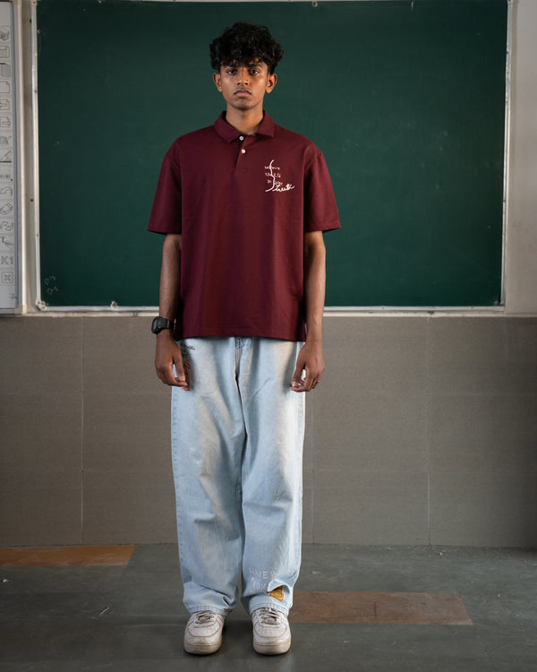 BELIEVE THE KID IN YOU EMBROIDERED WINE POLO
